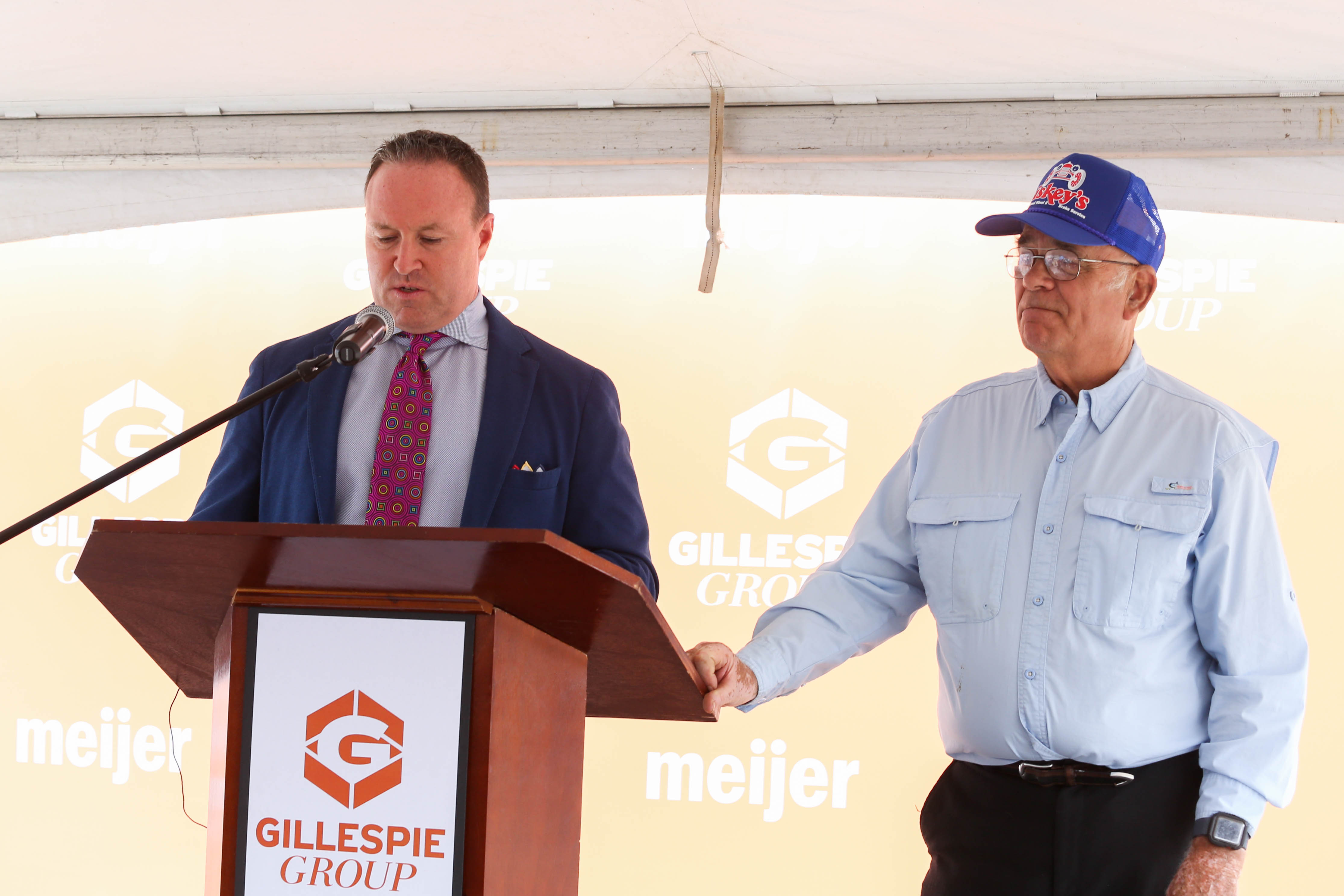 Pat Gillespie and Ed Carpenter, owner of Liskey's, speak at the downtown 600 E Michigan project announcement
